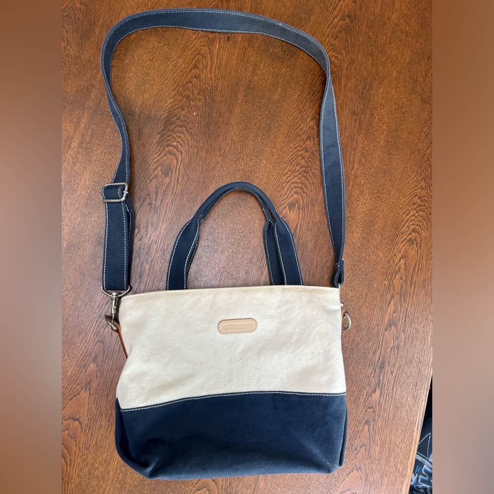 Amanda Smith canvas. Handbag/shoulder/crossbody versatility. Adjustable strap.
